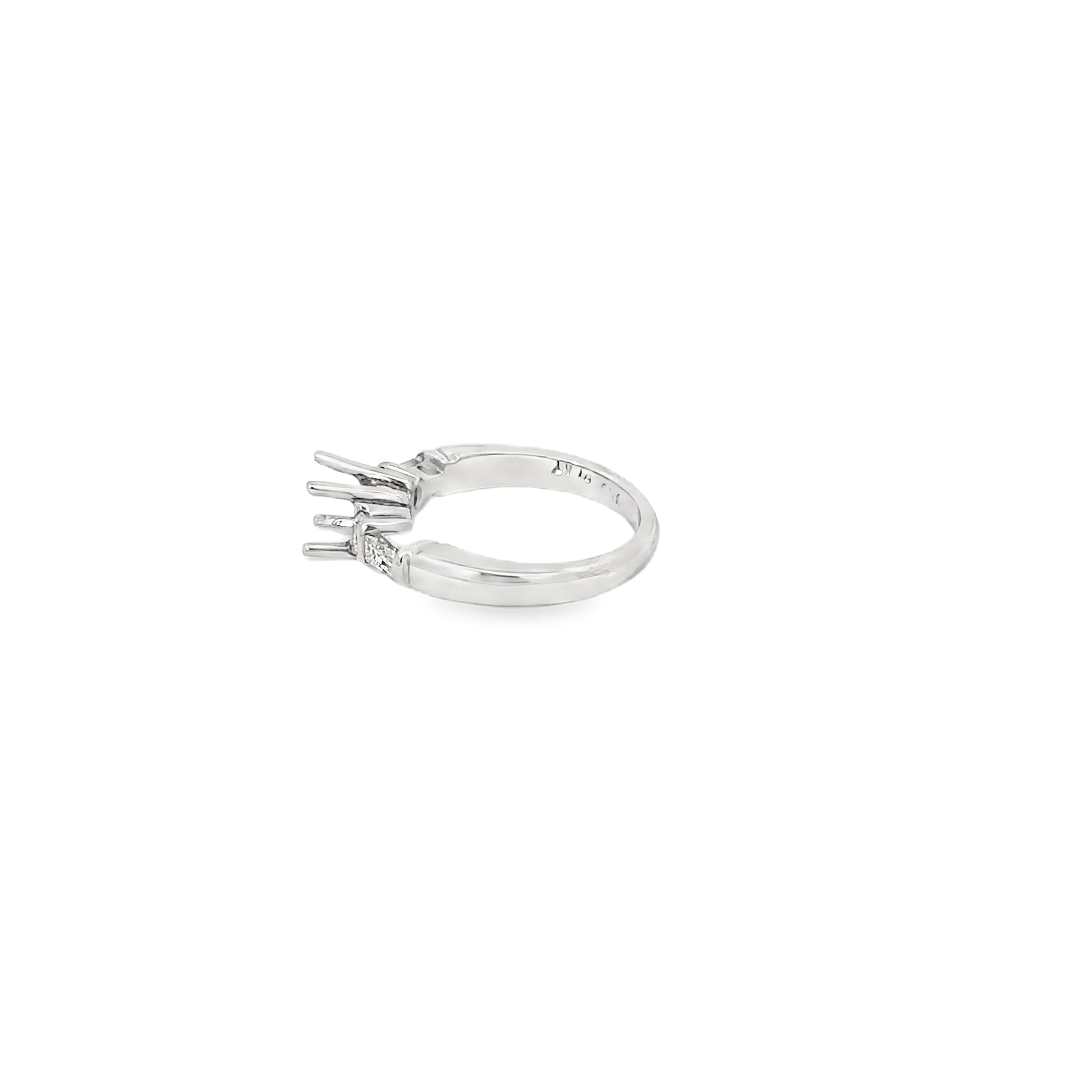 Platinum Diamond Engagement Ring with Two Round and Two Tapered Baguette Diamonds