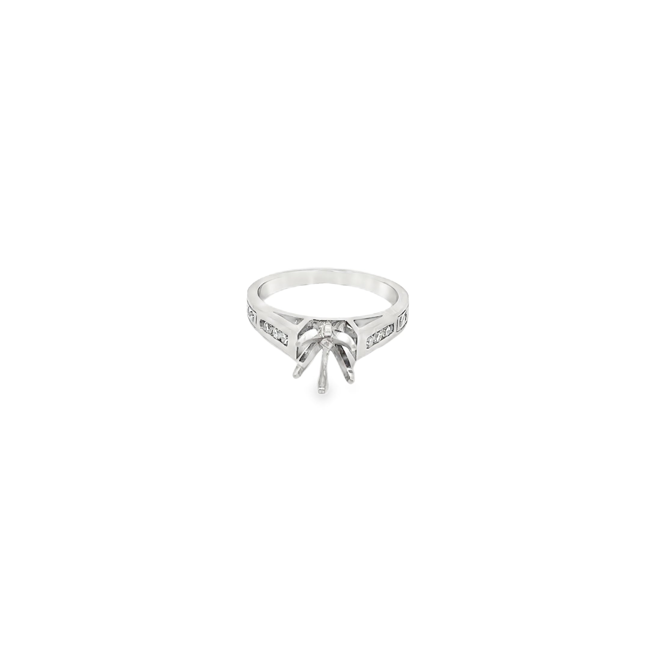 Platinum Engagement Ring with Channel Set Diamonds and an Engraved Design