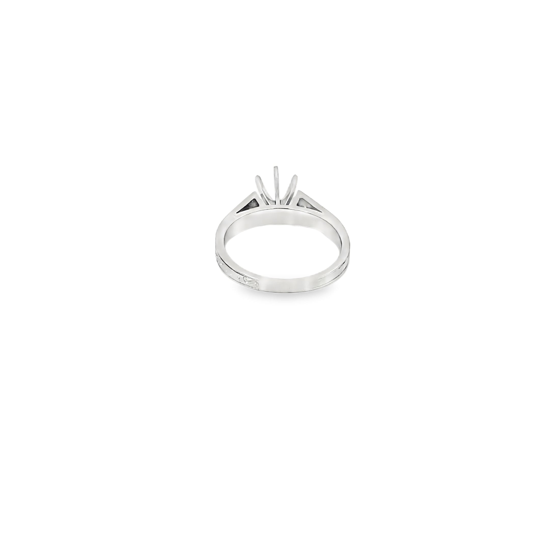 Platinum Engagement Ring with Channel Set Diamonds and an Engraved Design