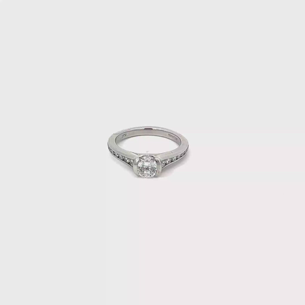 Platinum Half Bezel Engagement Ring with Channel Set Diamonds