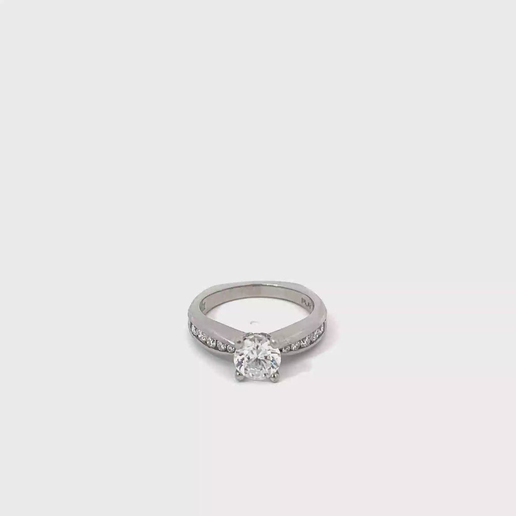 Platinum Diamond Engagement Ring with Graduated Channel Set Diamonds