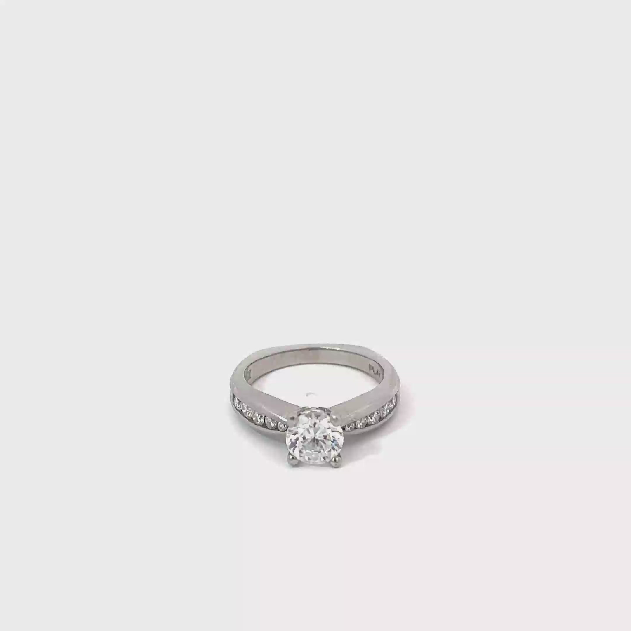 Platinum Diamond Engagement Ring with Graduated Channel Set Diamonds