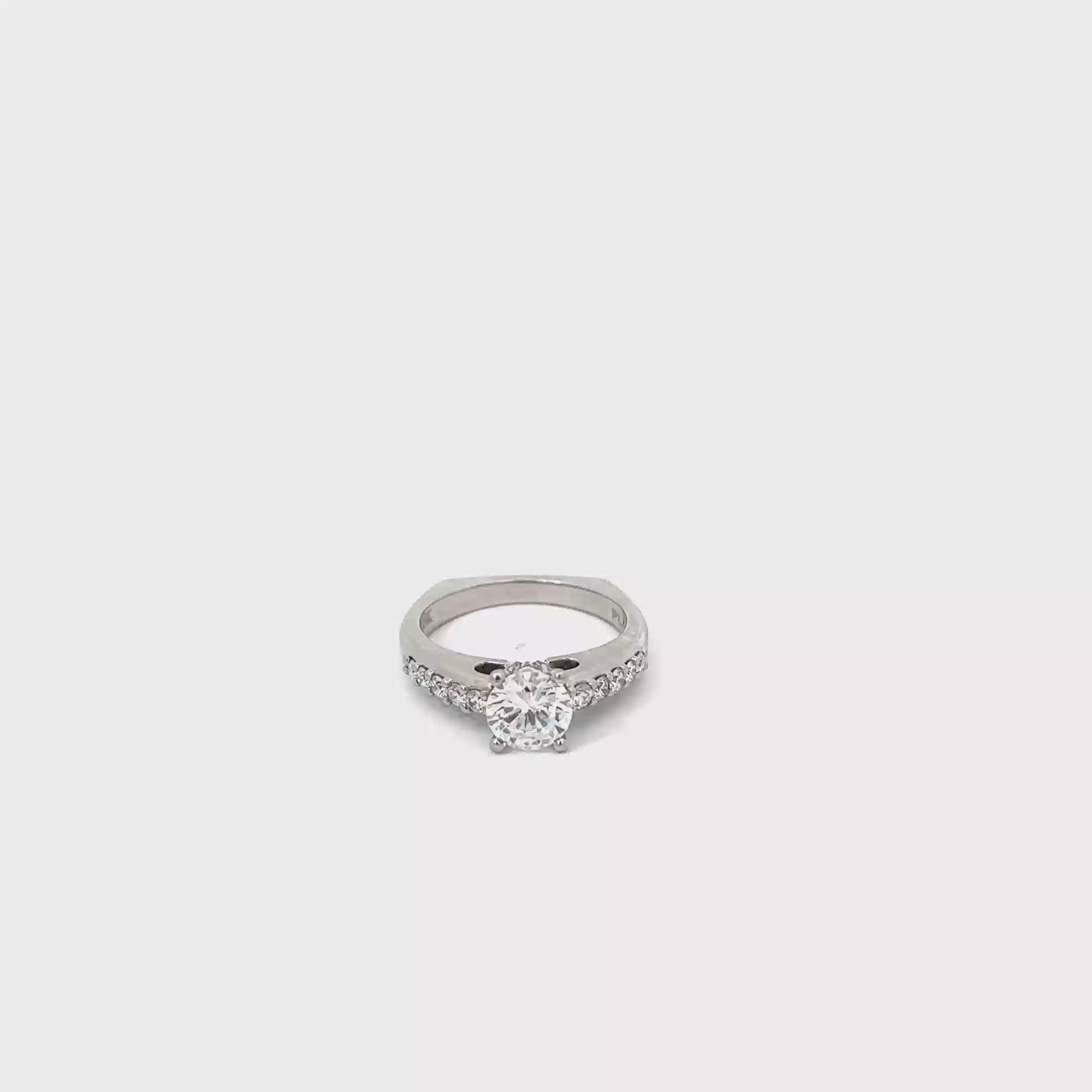 Platinum Diamond Engagement Ring with Graduated Channel Set Diamonds with Shared Prongs
