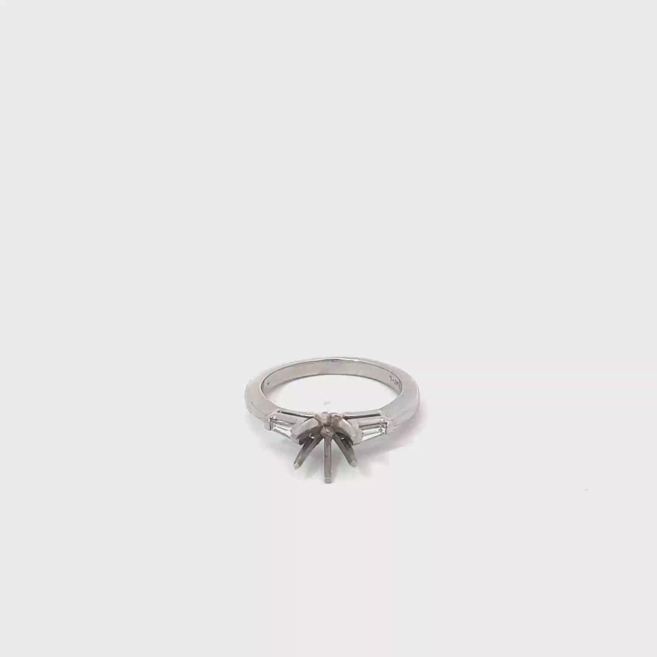 Platinum and Two Tapered Baguette Engagement Ring
