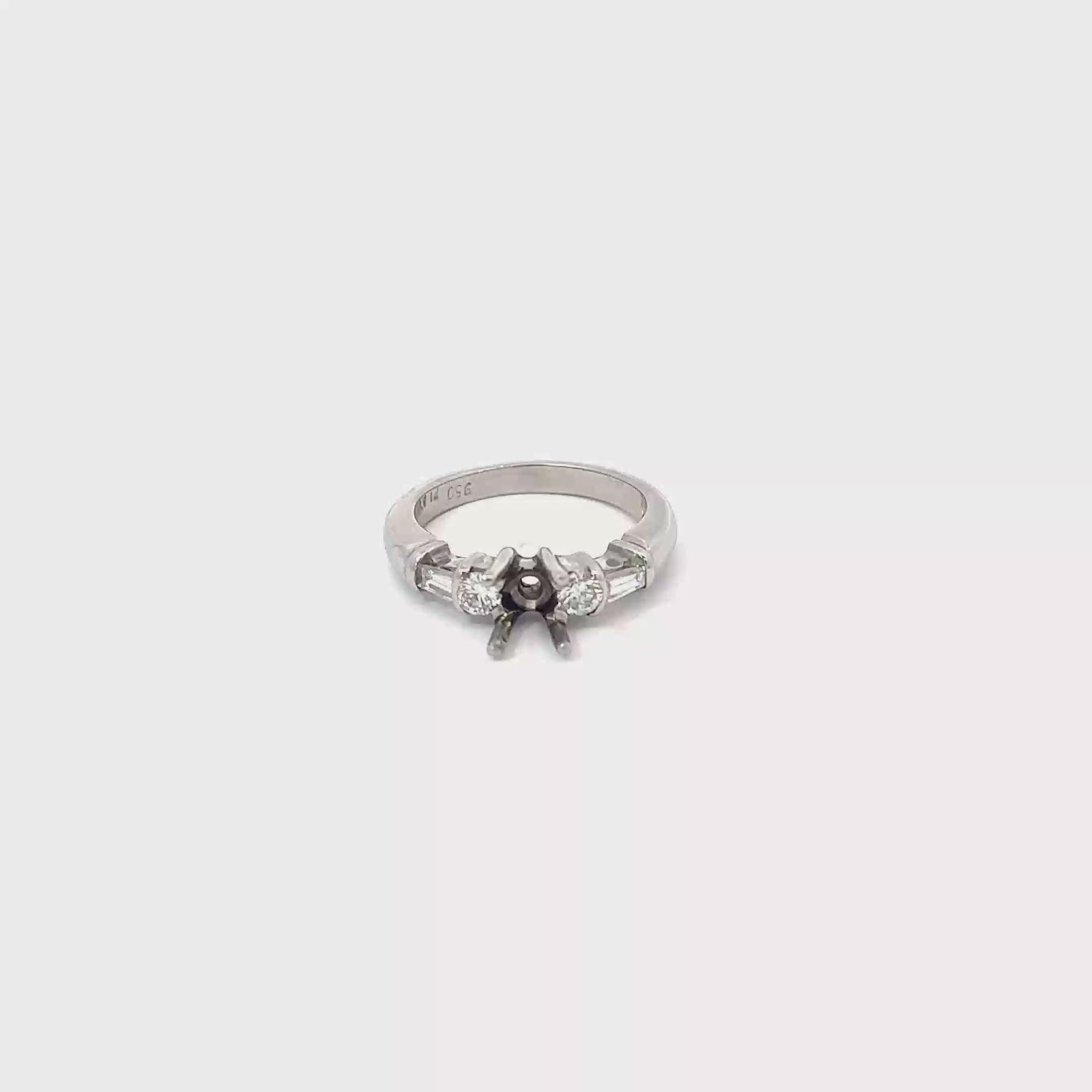 Platinum Diamond Engagement Ring with Two Round and Two Tapered Baguette Diamonds