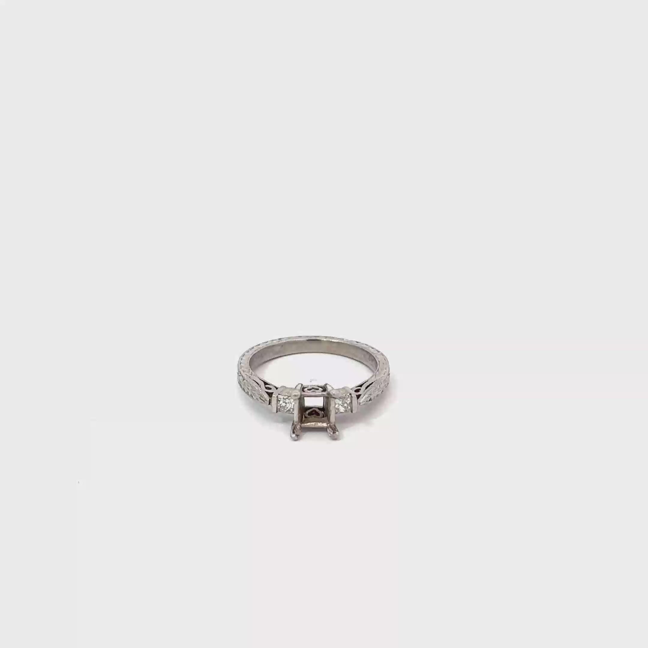 Platinum Solitaire Engagement Ring with 2 Princess Cut Diamonds