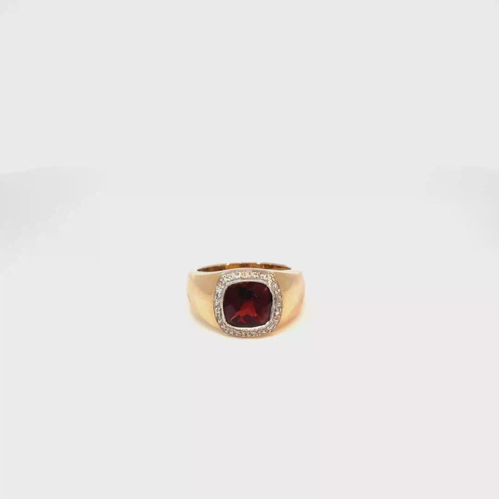 14K Yellow Gold Cushion Cut Garnet Ring with a Diamond Halo